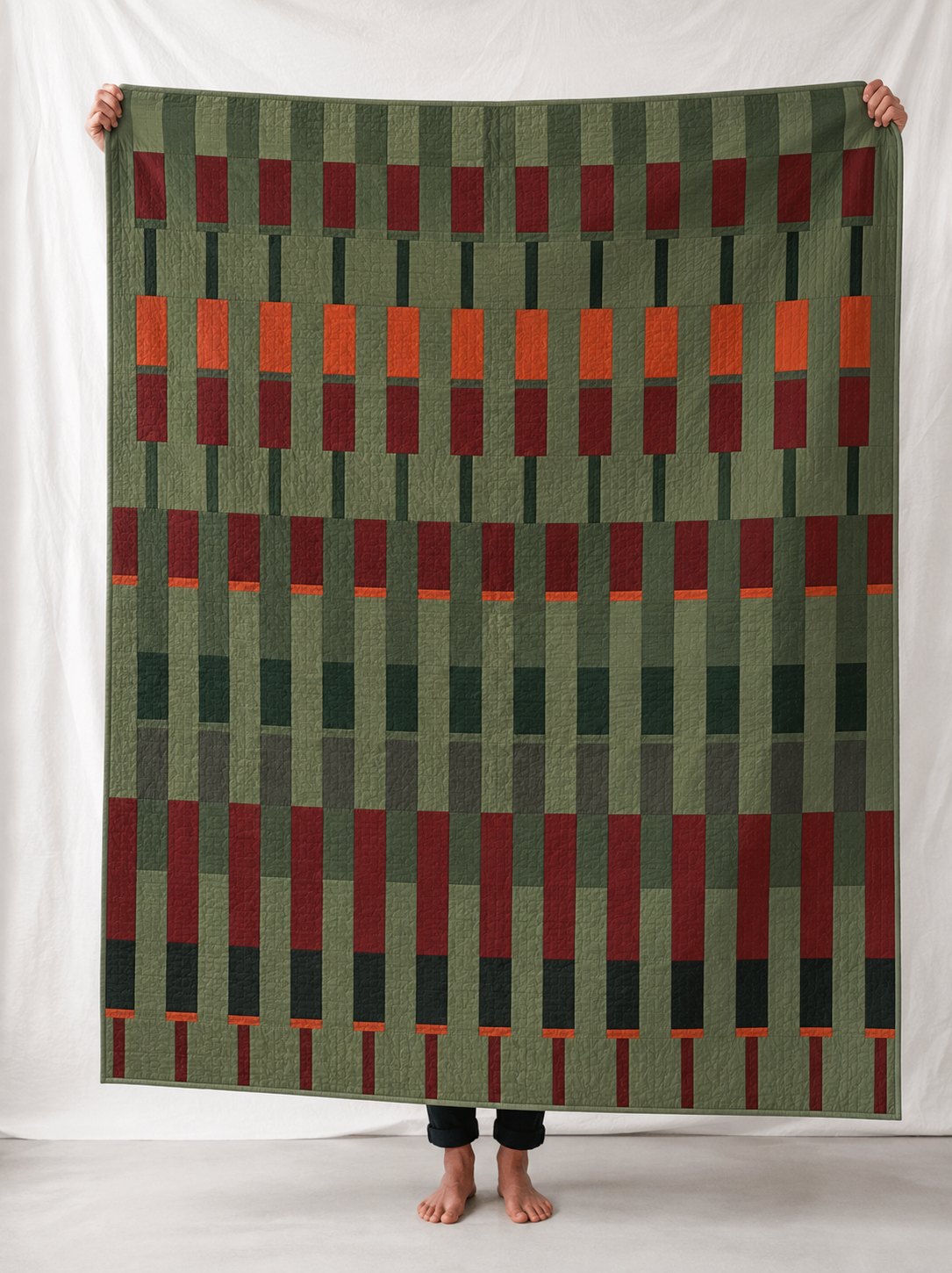 Lineage in the MOSS & EMBER colourway, digitally rendered in a room.